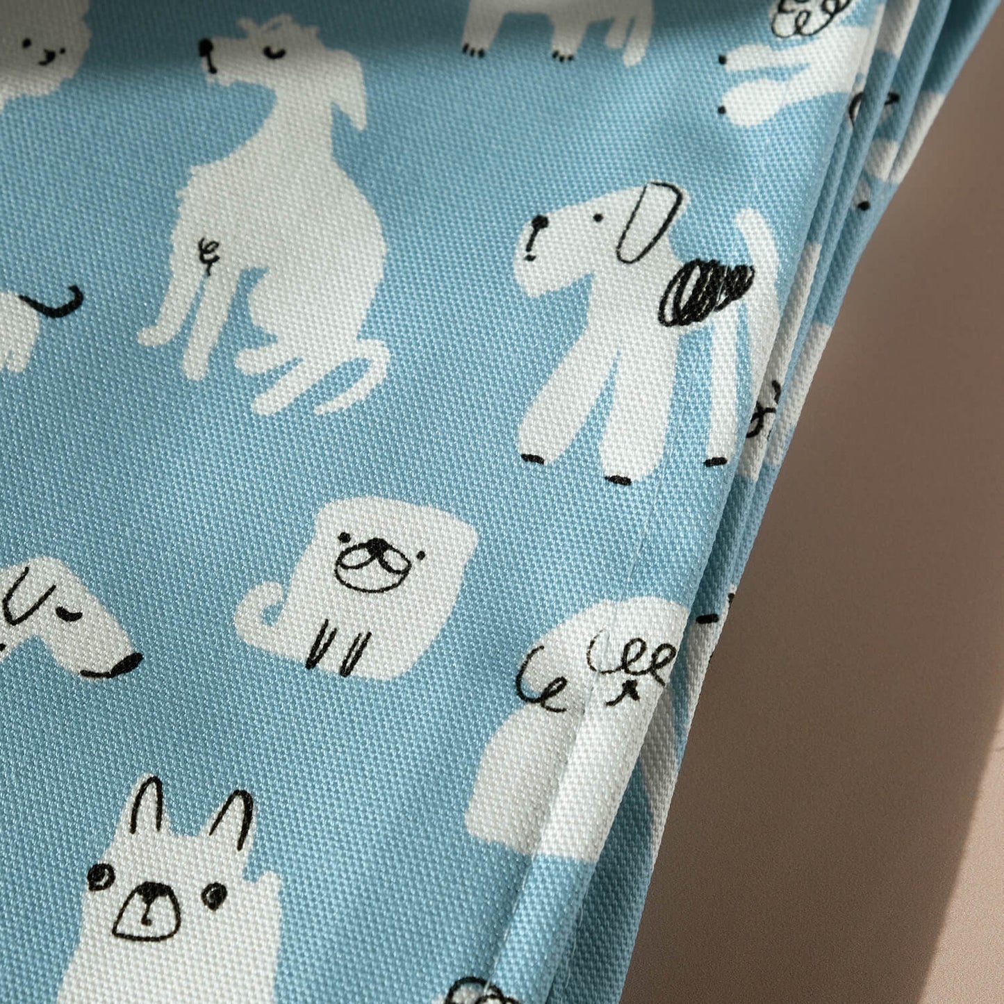 Close up of Dog Tea Towel to show a sitting sighthound on a blue background - The Moonlit Press UK