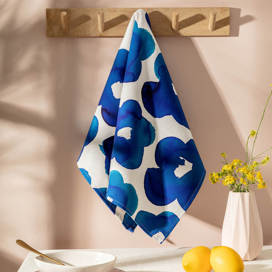 Blue Flower Tea Towel hanging in a pink kitchen - The Moonlit Press