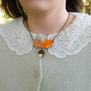 Oak Leaf and Acorn Necklace Worn with Green Jumper - The Moonlit Press