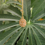 Load image into Gallery viewer, Gold sun pendant on gold chain
