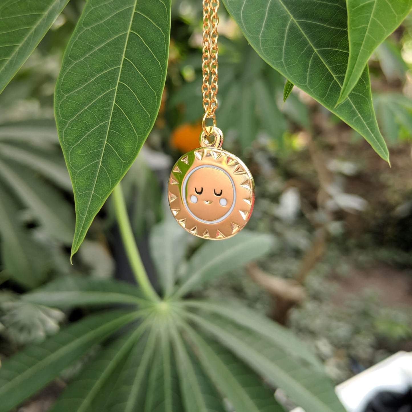 Small gold sunshine necklace