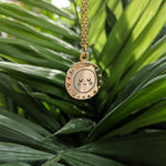 Load image into Gallery viewer, Small gold sun necklace - The Moonlit Press UK
